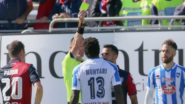 Footballer walks off after 'racist abuse'