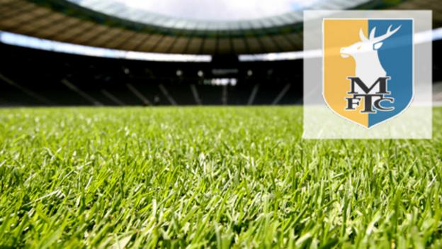 Mansfield sign Swans defender Alfei