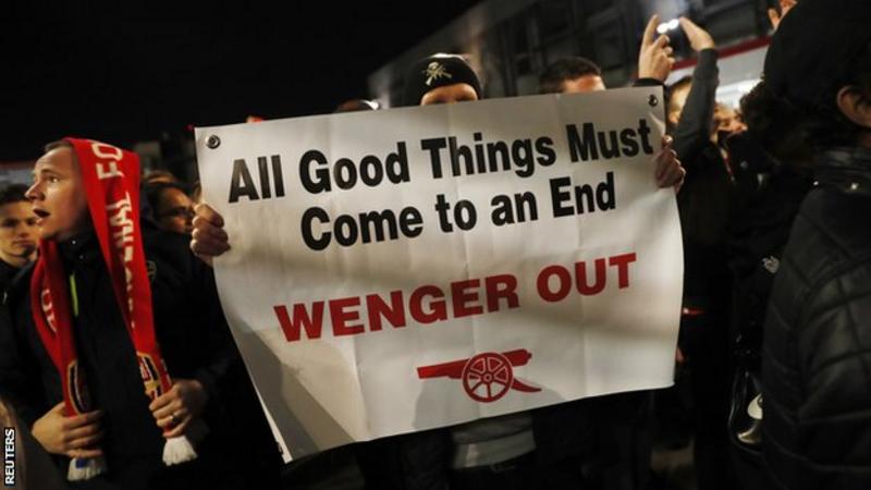 Fans protesting against Arsene Wenger