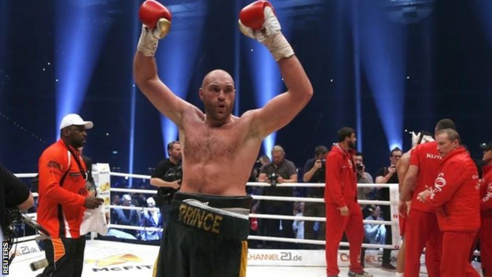 Tyson Fury celebrates victory