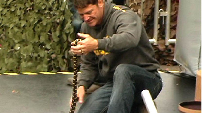 Steve Backshall holding a snake