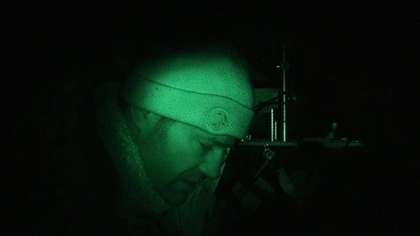 Steve Backshall in the Transylvanian forest at night