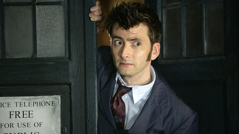 The Doctor at the TARDIS door.