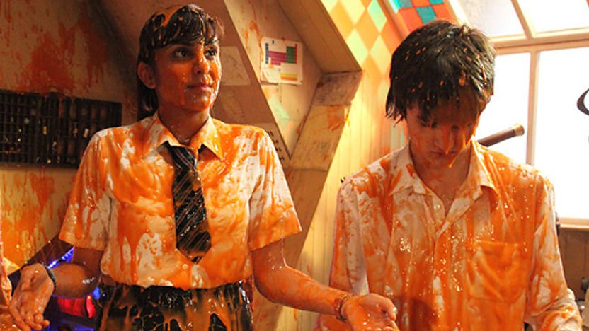 Anj and Tommy covered in alien goo.