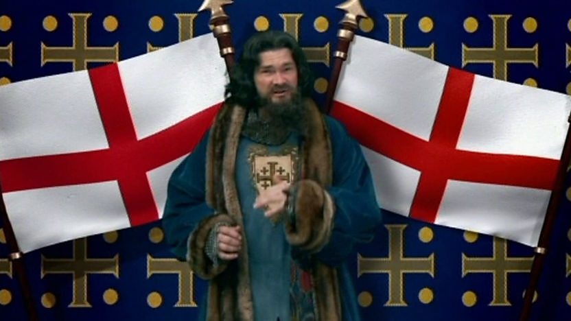 King William I sings in front of the English flag