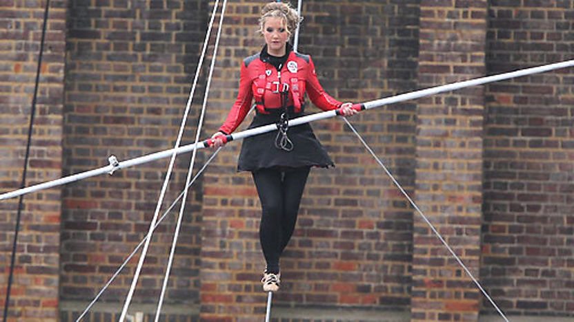 Blue Peter presenter Helen Skelton walking on a tightrope.