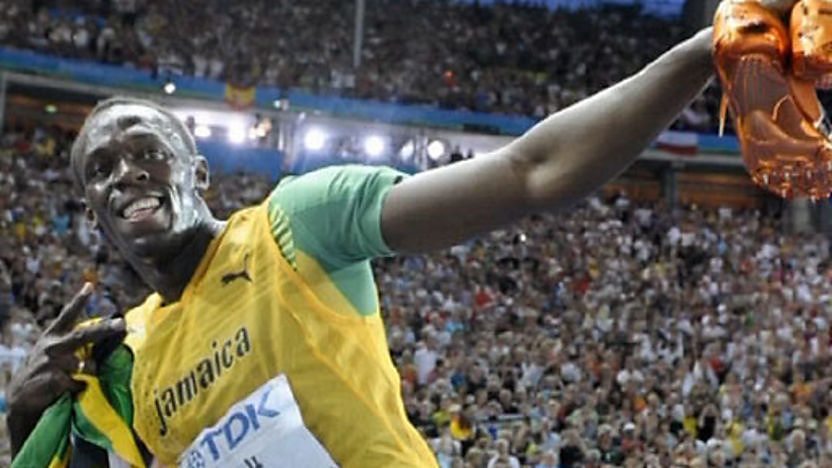 Jamaican sprinter Usain Bolt celebrating. 