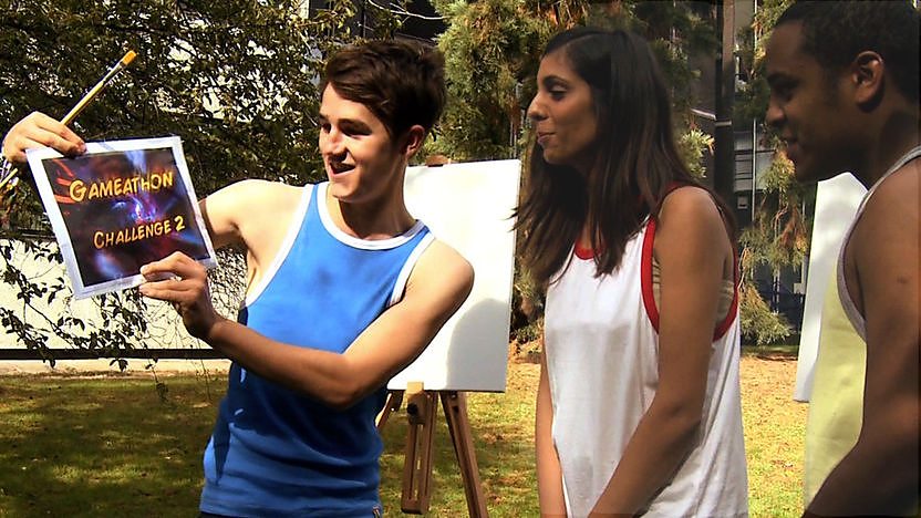 Tommy holding the challenge with Anjli and Danny.
