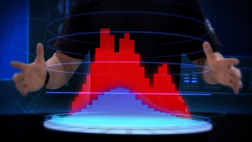 Steve Backshall's hands in front of a 3D sound wave projection.
