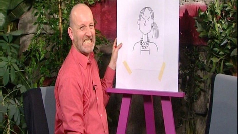 Tracy Beaker illustrator Nick Sharratt sat in front of an easel
