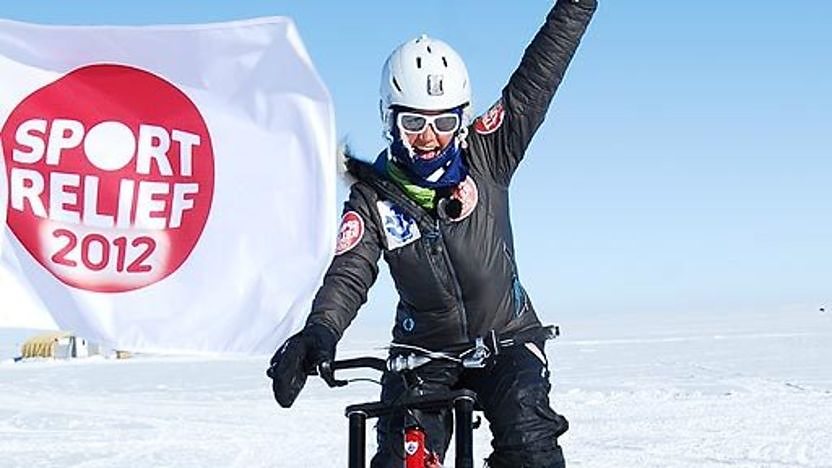 Helen Skelton punches the air as she reaches the South Pole