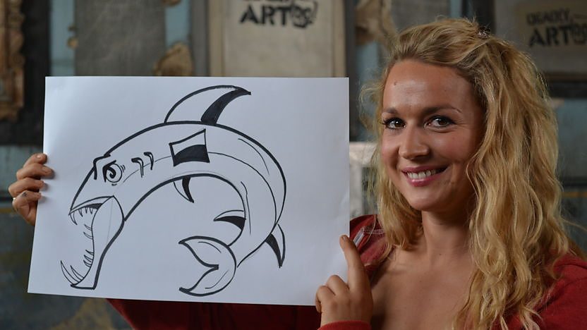 Nicola with a drawing of a barracuda.