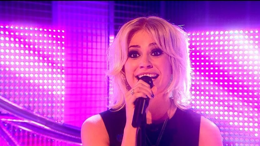 Pixie Lott singing in the Blue Peter studio.