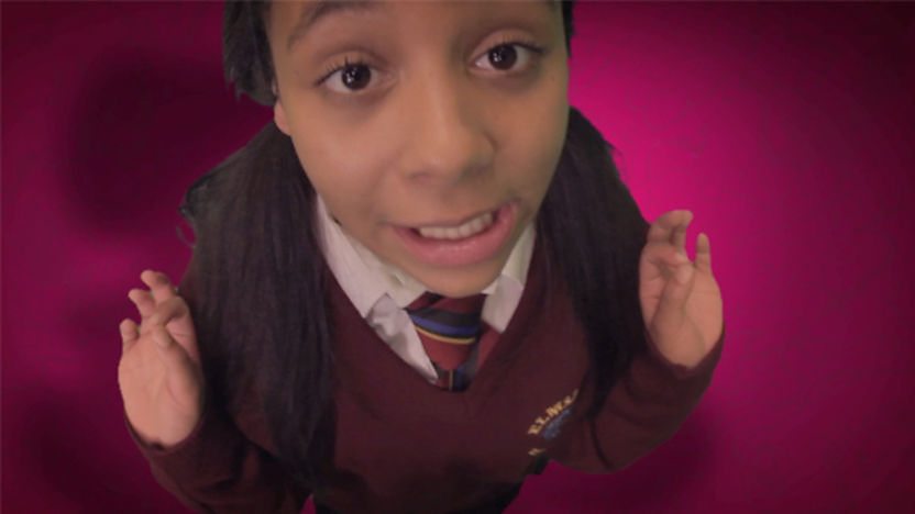 Image of Agness rapping.