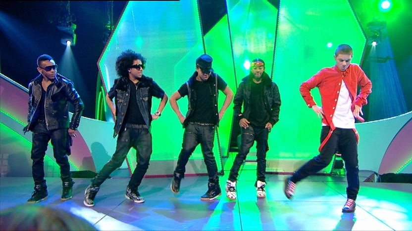 Aidan Davis and Mindless Behavior on stage dancing. 