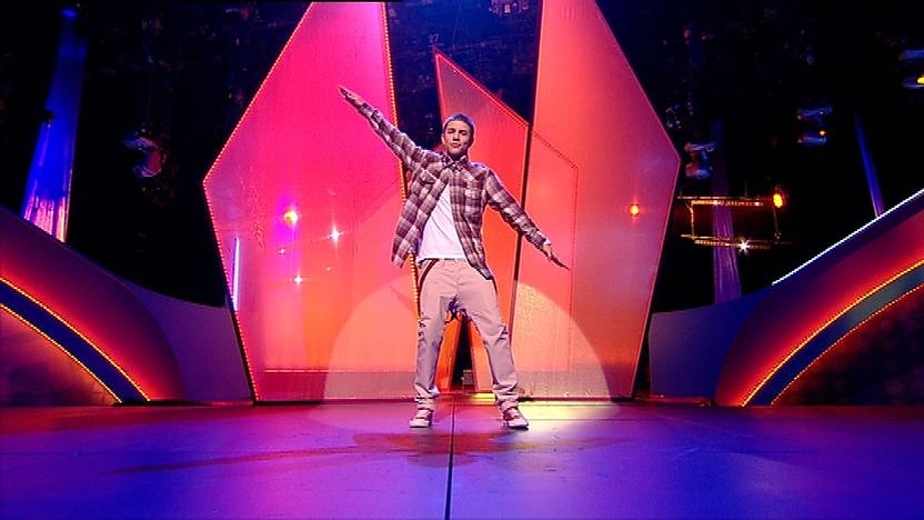 Aidan Davis on stage dancing.