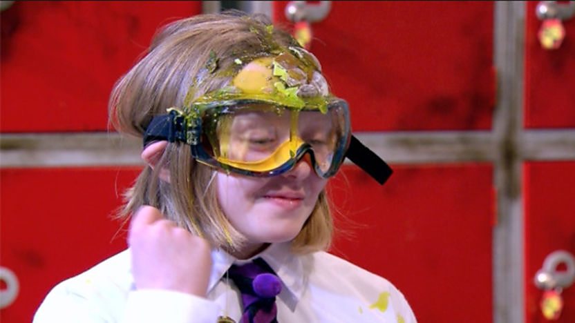 Image of a girl who has been splattered with rotten eggs. 