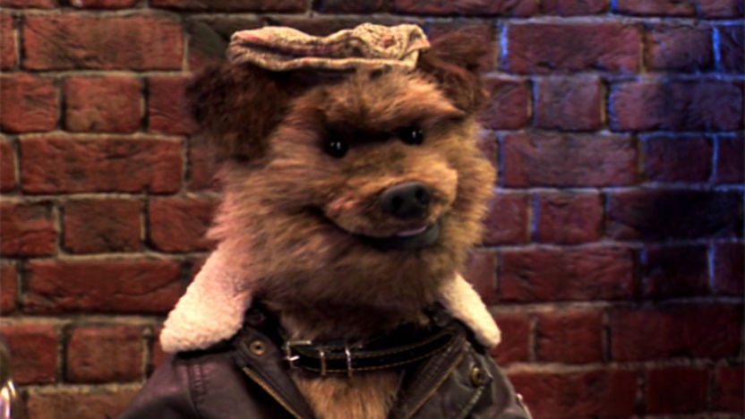 Hacker in a flat cap.