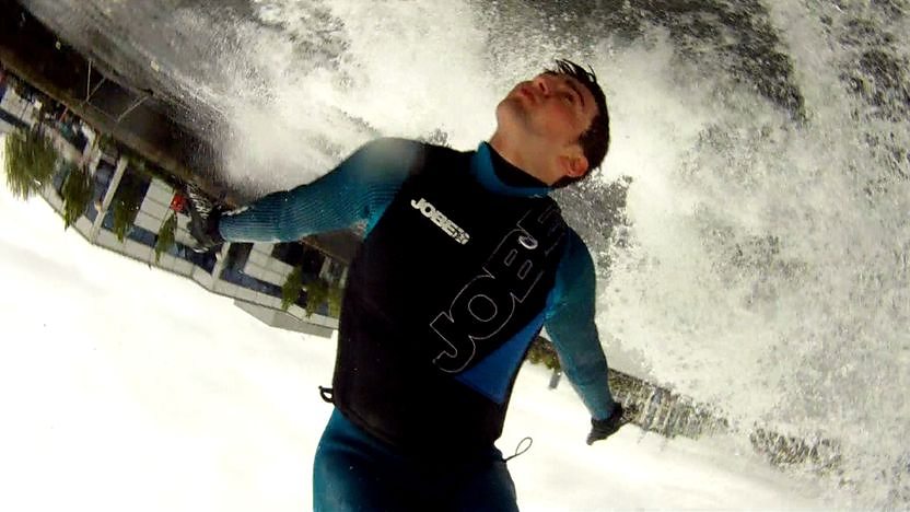 Jack Moule, one of the world's best Jet Skiiers upside down with no hands on the Jet-Ski over the water.
