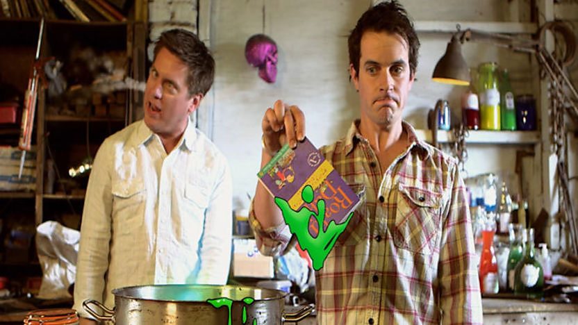 Dick and Dom acting out a scene from George's Marvellous Medicine by Roald Dahl