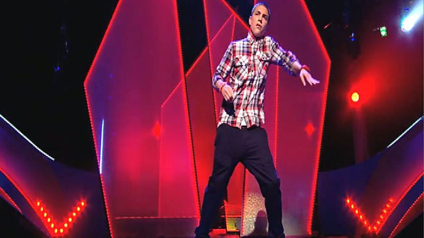 Aidan Davis dancing on stage. 