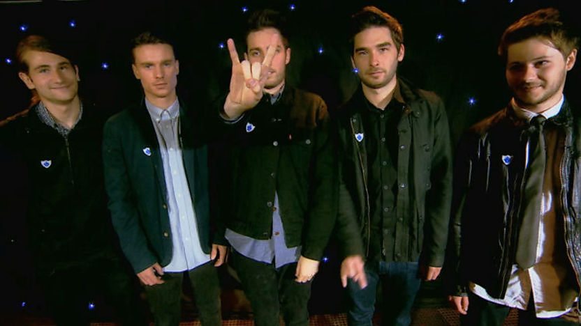 You Me At Six band members standing in a row