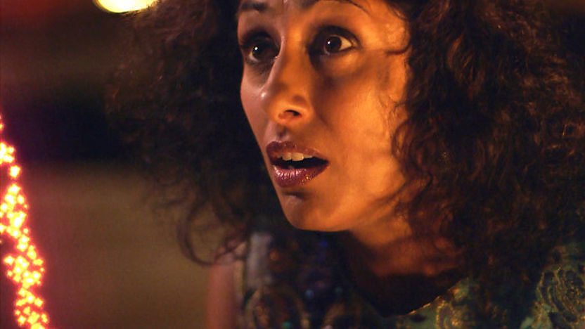 Trade Your Way to the USA's Saira Kahn watching an animated firework explode from a book