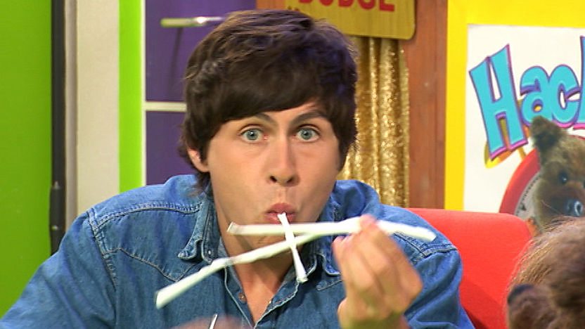 Ben with paper coming out of his mouth.
