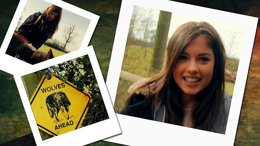 Aimee, a wolf sign and a wolf.
