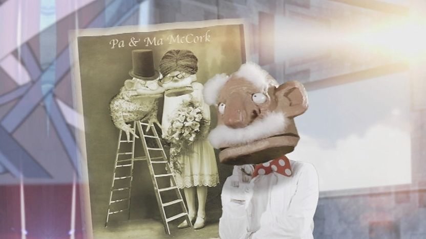 The professor with a picture of his grandparents.