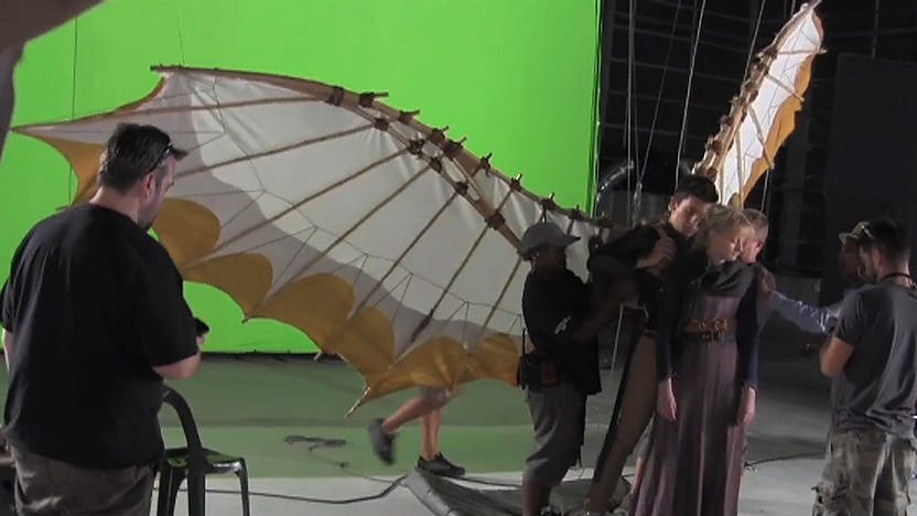 Cast in front of green screen