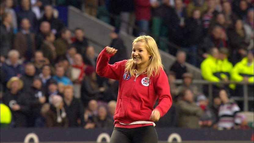 Helen at a rugby pitch