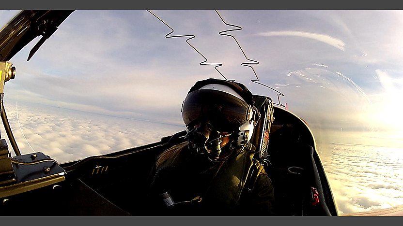 Helen sitting in a Red Arrows Jet