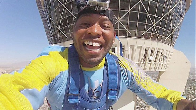 man jumping from tower