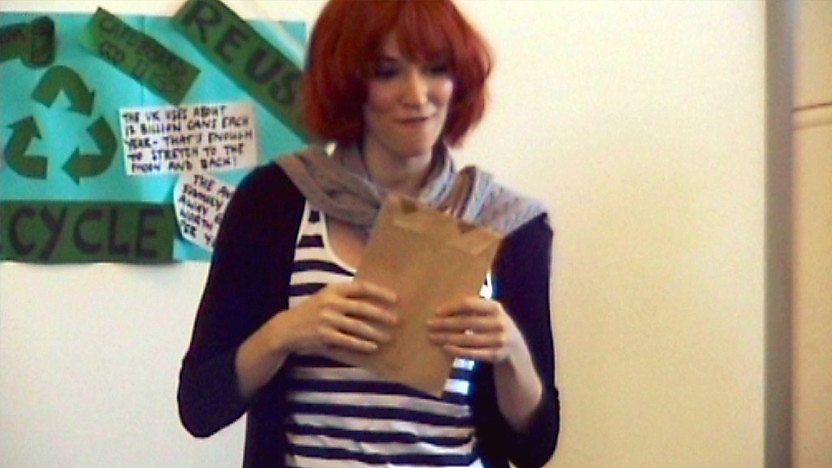 Katherine Mills holding an envelope