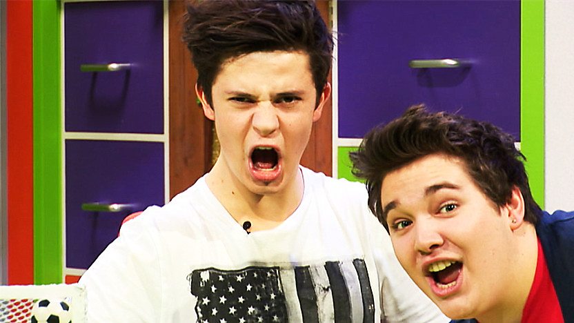 Chris Johnson and Cel Spellman pulling funny faces in the CBBC Office.