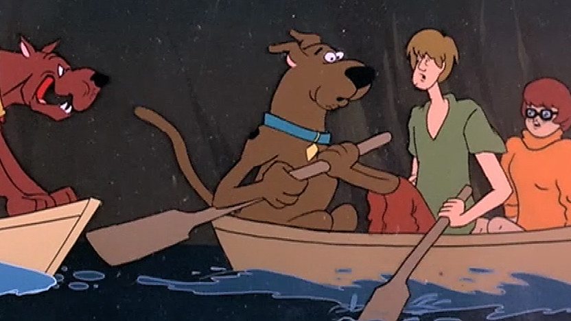 Scooby, Shaggy and Velma in a boat.