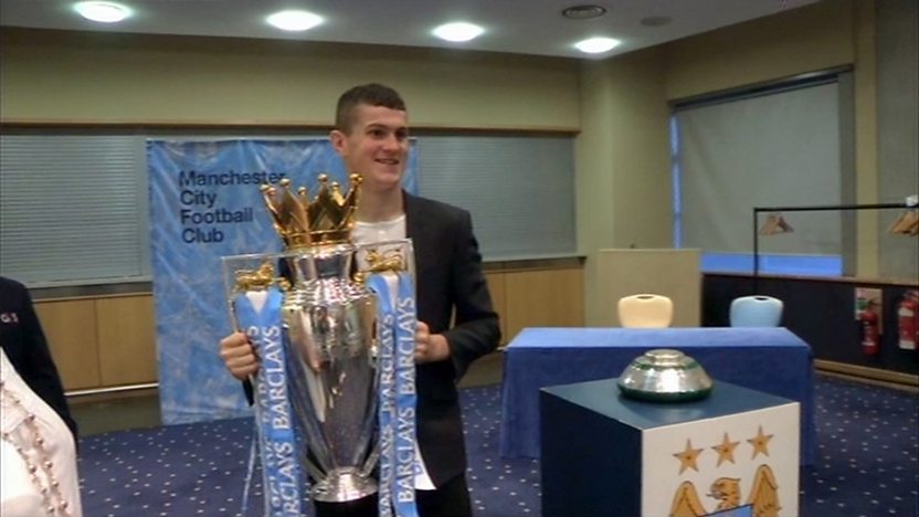 Billy holding the Championship cup