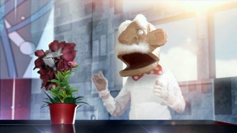 Dr. Mike McCork singing at a plant