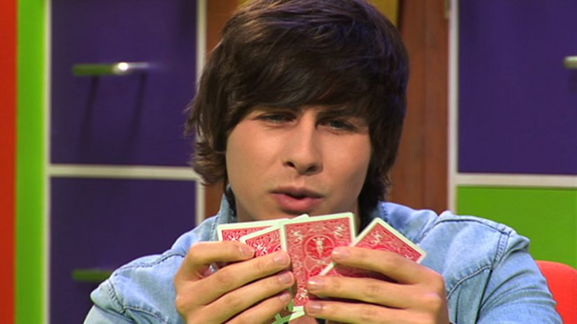 Ben Hanlin holding some cards.