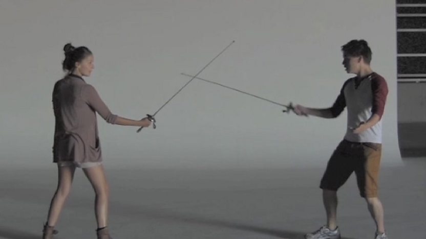 Colin and Flora in sword training