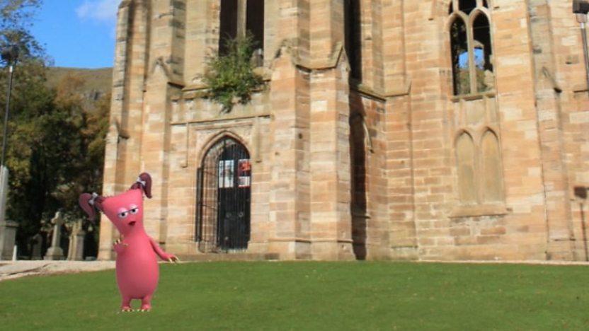 A bugbear in front of a church