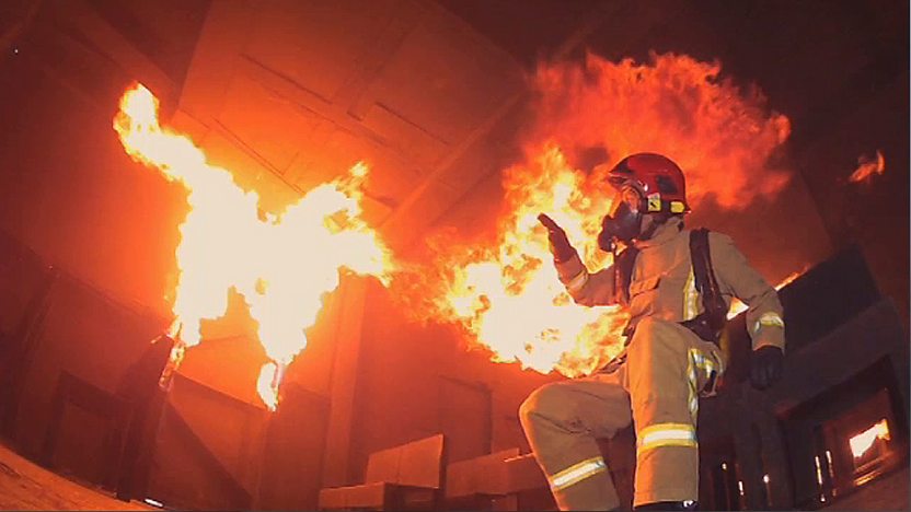 Leo sits in a room of fire