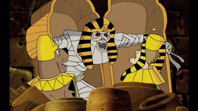 Egyptian mummy scaring Scooby Doo and Shaggy