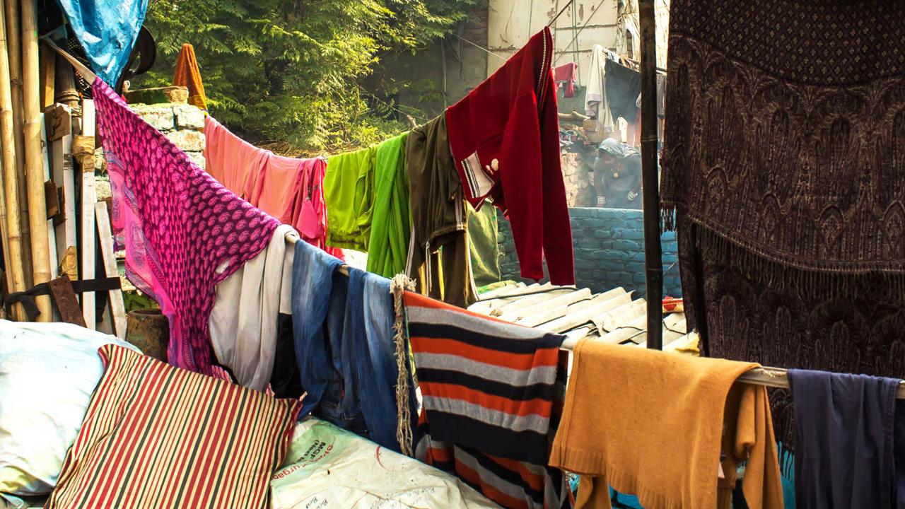 Colourful laundry lines crisscross Kathputli (Credit: Credit: Mariellen Ward) Colourful laundry lines crisscross Kathputli (Credit: Credit: Mariellen Ward)