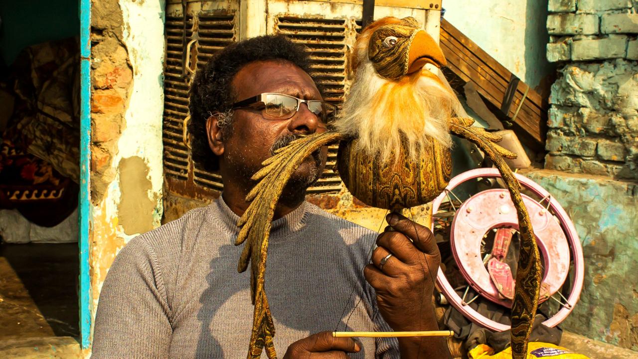 Puran Bhatt expertly wields his handcrafted puppet (Credit: Credit: Mariellen Ward) Puran Bhatt expertly wields his handcrafted puppet (Credit: Credit: Mariellen Ward)