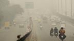 Delhi highway signs are barely visible. (Manoj Kumar/Hindustan Times/Getty Images)