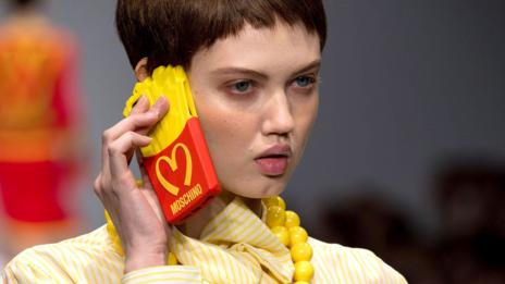 Like Warhol, Jeremy Scott has celebrated symbols of consumer culture Like Warhol, Jeremy Scott has celebrated symbols of consumer culture