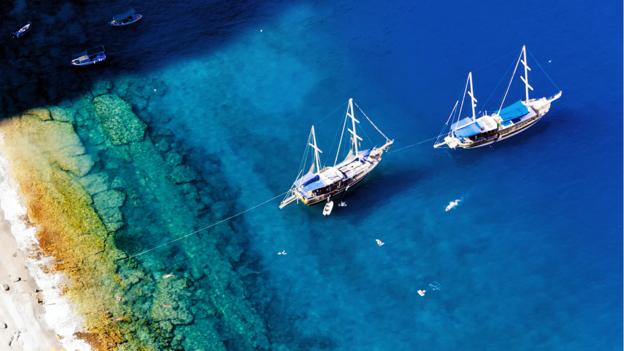 Gulet boats moor in the Mediterranean (Credit: Paul Biris/Getty) Gulet boats moor in the Mediterranean (Credit: Paul Biris/Getty)