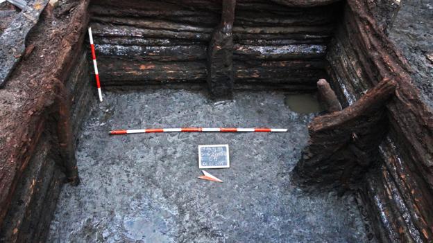 The base of a medieval house in St George Square, Romania 